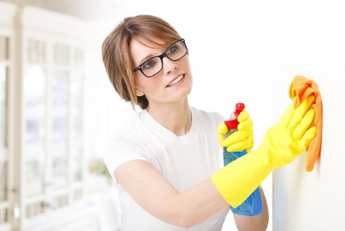 Carpet cleaning technician preparing equipment safely